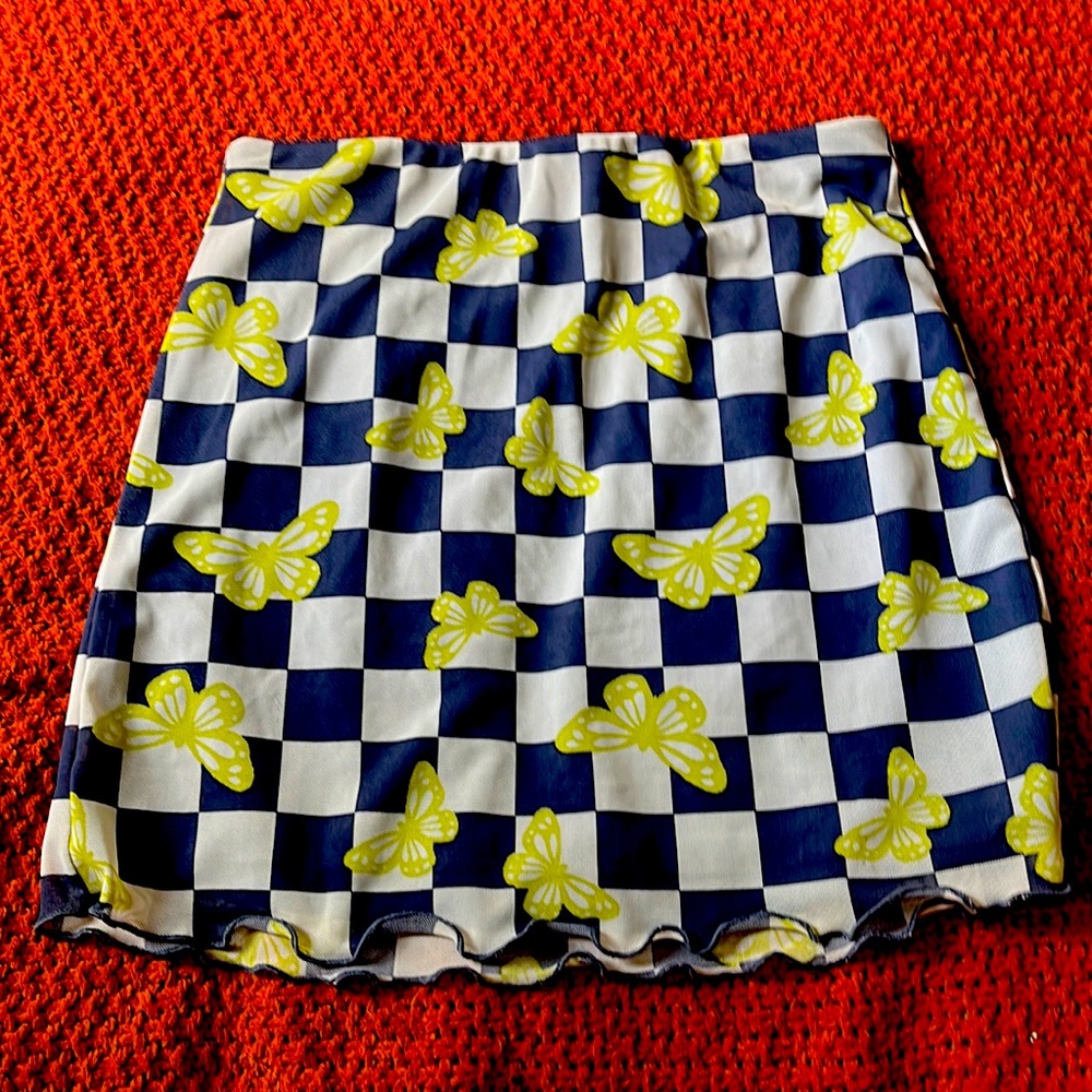 Blue and white pencil skirt with green butterfly’s
